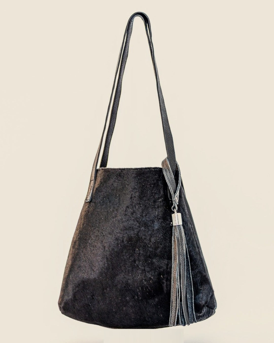 Atlantica Hair-on-Hide Tote — black hide clipped into mini bucket shape | Sangre de Mar handcrafted leather