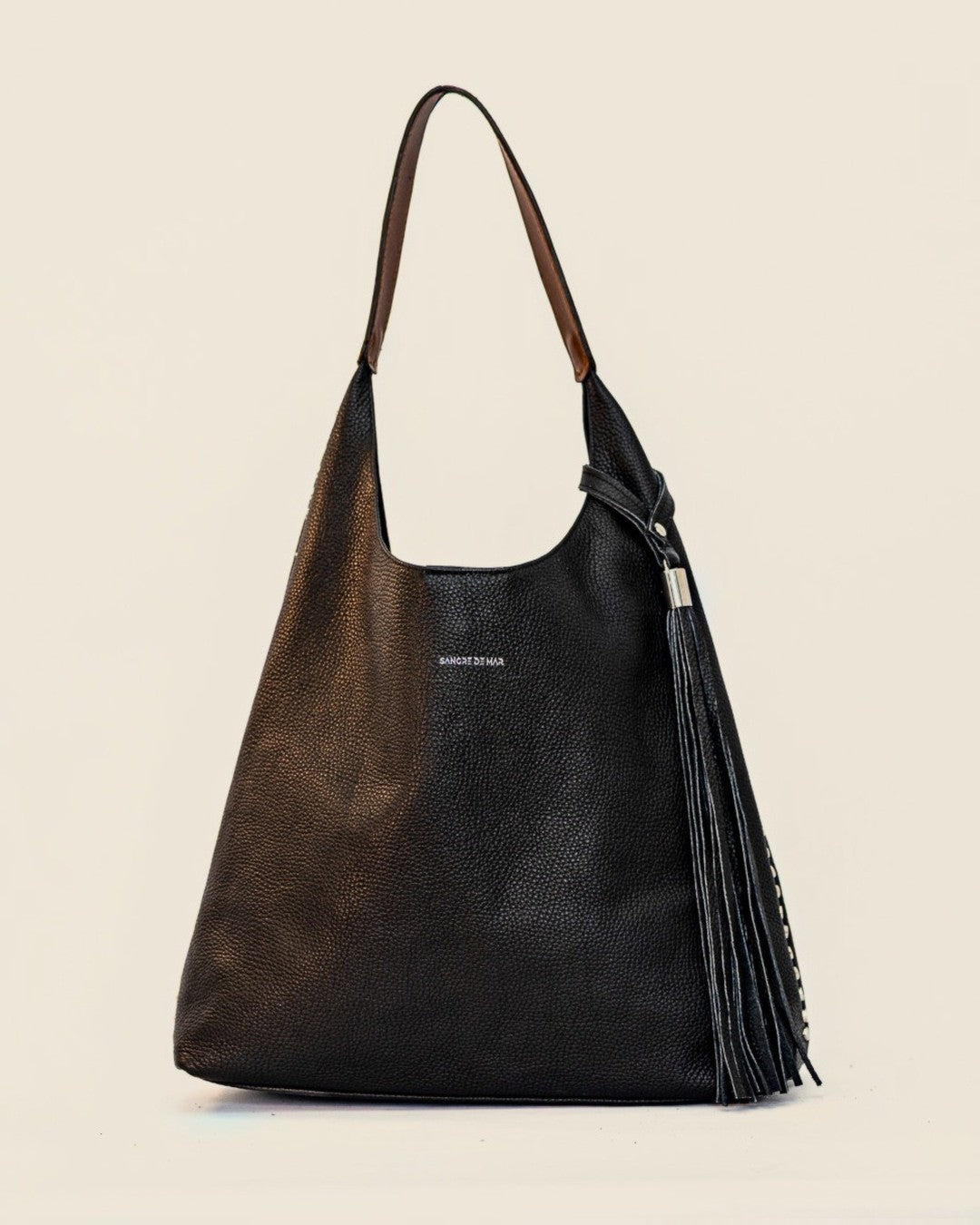 Sienna Hand-Finished Tote — black full-grain leather with hand-pressed studs, tan strap — front | Sangre de Mar handcrafted leather #Colour_Black · Tan strap