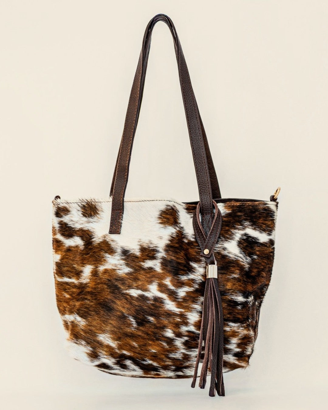 Atlantica Hair-on-Hide Tote — brown and white hide, tote shape — front view | Sangre de Mar handcrafted leather