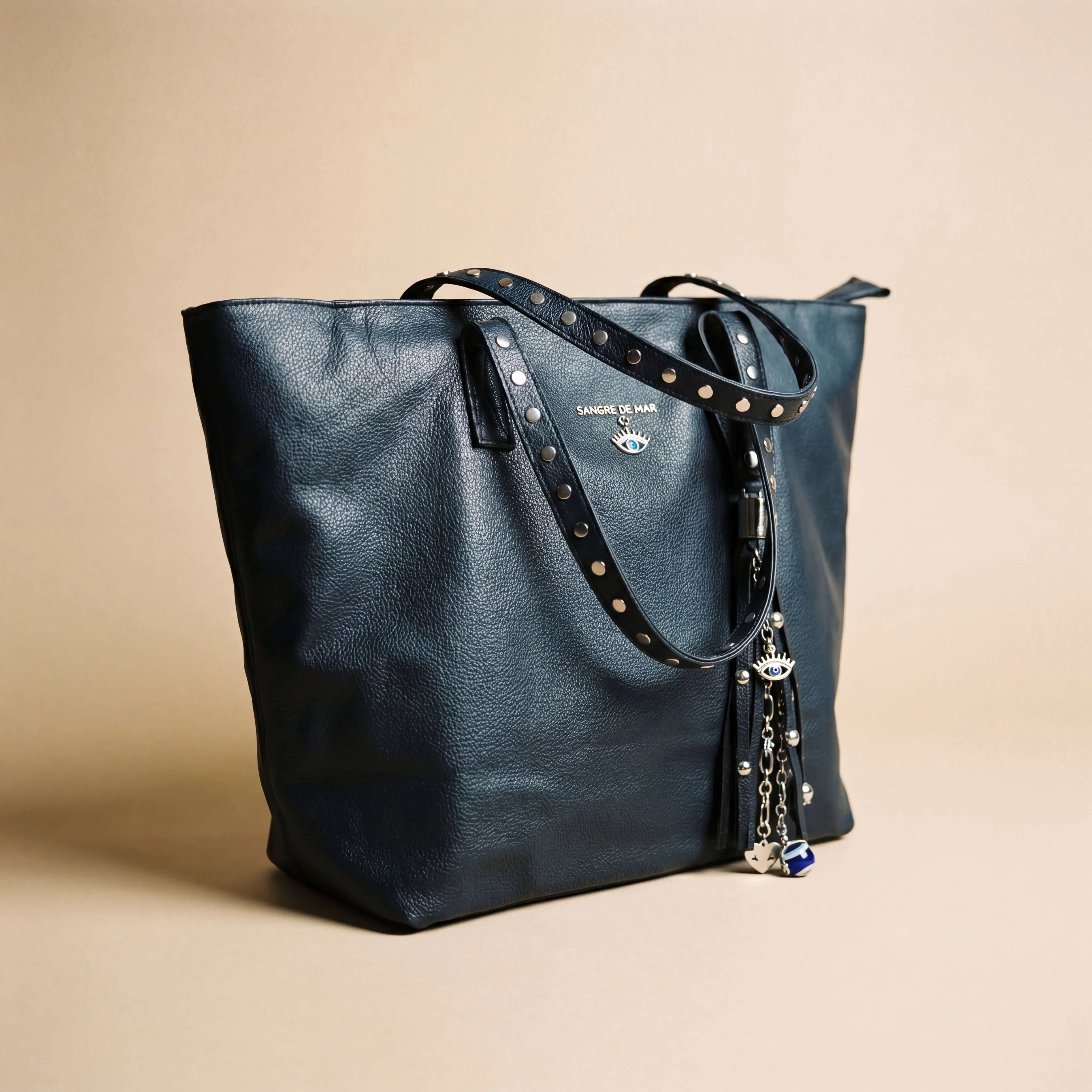 sangre-de-mar-marea-tote-navy-pebbled-leather in studio